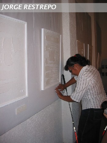 Blind person visiting the exhibit